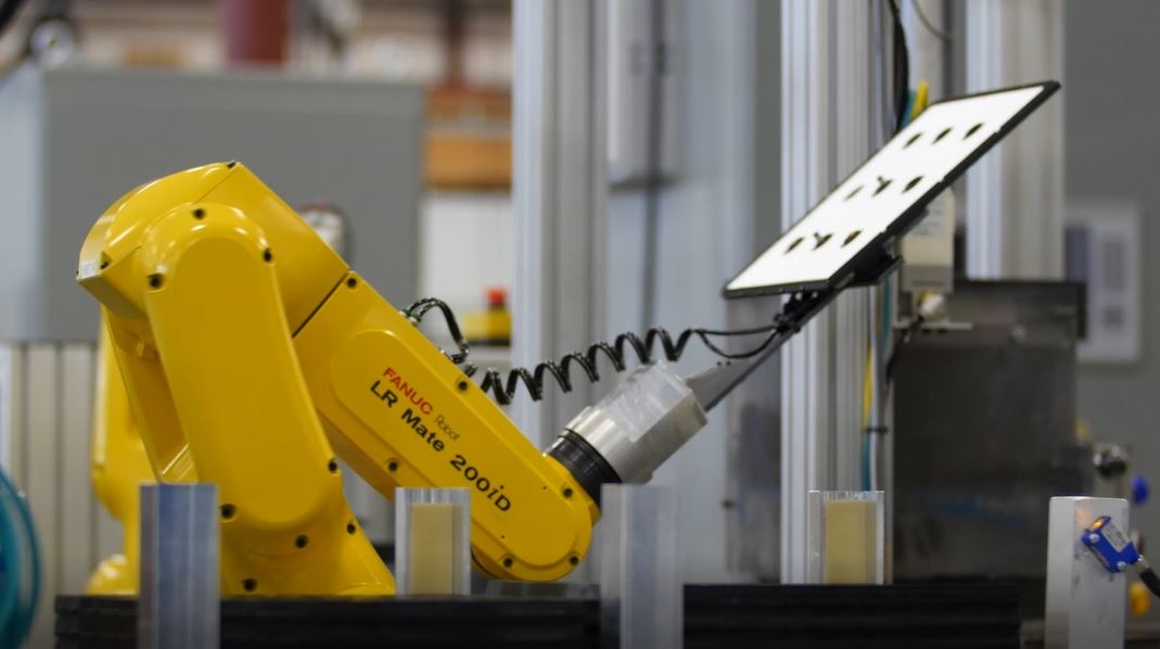 FANUC LR Mate 200iD handling pasted plates on production line